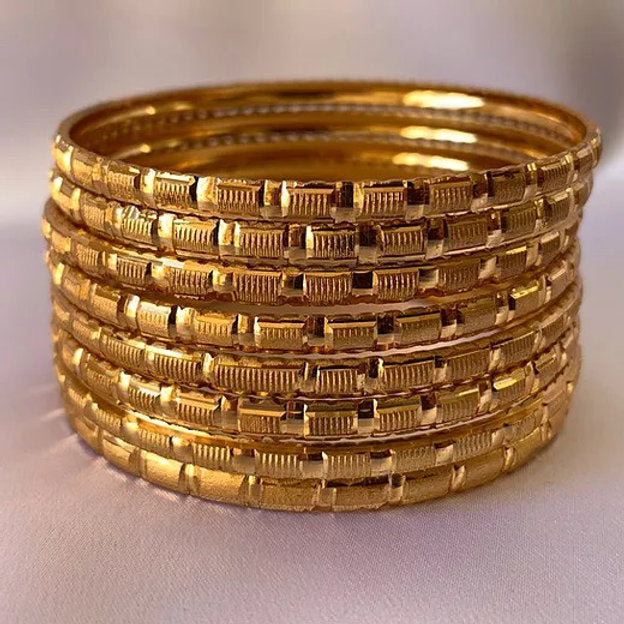 8 Gold Bangle set